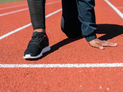 Focus on running shoes and stable foot positioning.